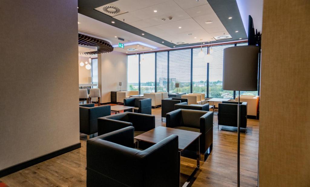 Posedenie v ubytovaní Holiday Inn Dąbrowa Górnicza-Katowice by IHG