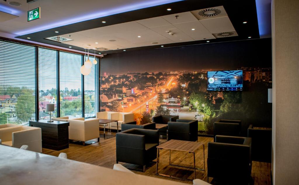 Posedenie v ubytovaní Holiday Inn Dąbrowa Górnicza-Katowice by IHG