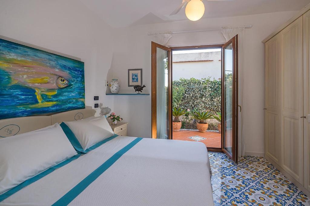 Postel nebo postele na pokoji v ubytování Hotel Villa Maria