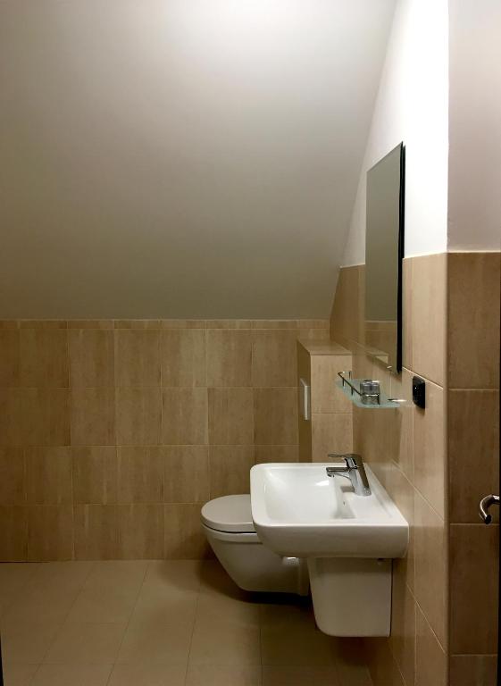 Koupelna v ubytování Apartmány Šachty