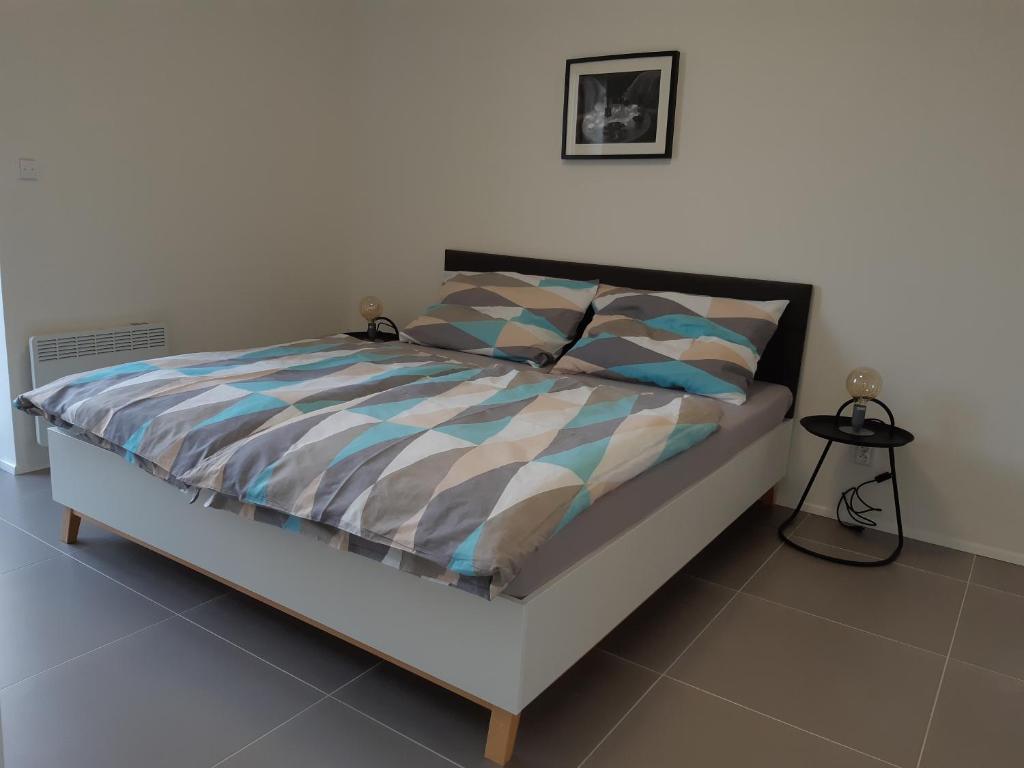 Postel nebo postele na pokoji v ubytování Rezidence Pavlov