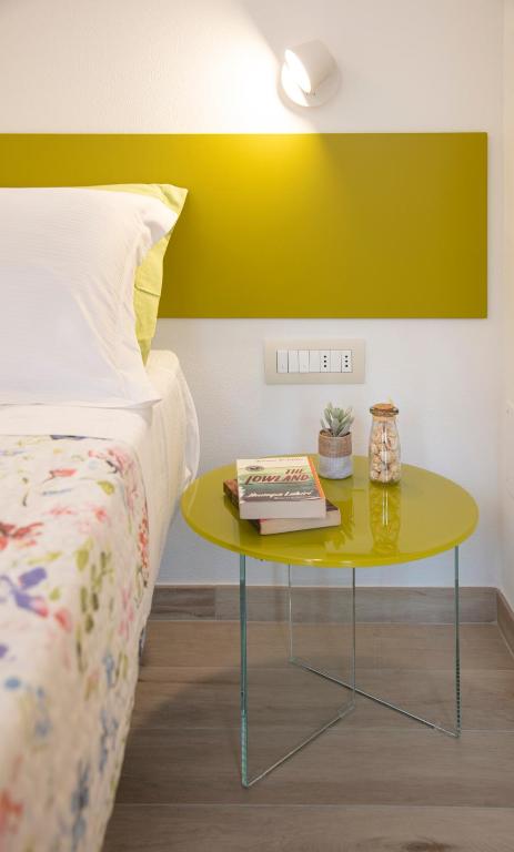 Postel nebo postele na pokoji v ubytování ARIA Design B&B Levanto