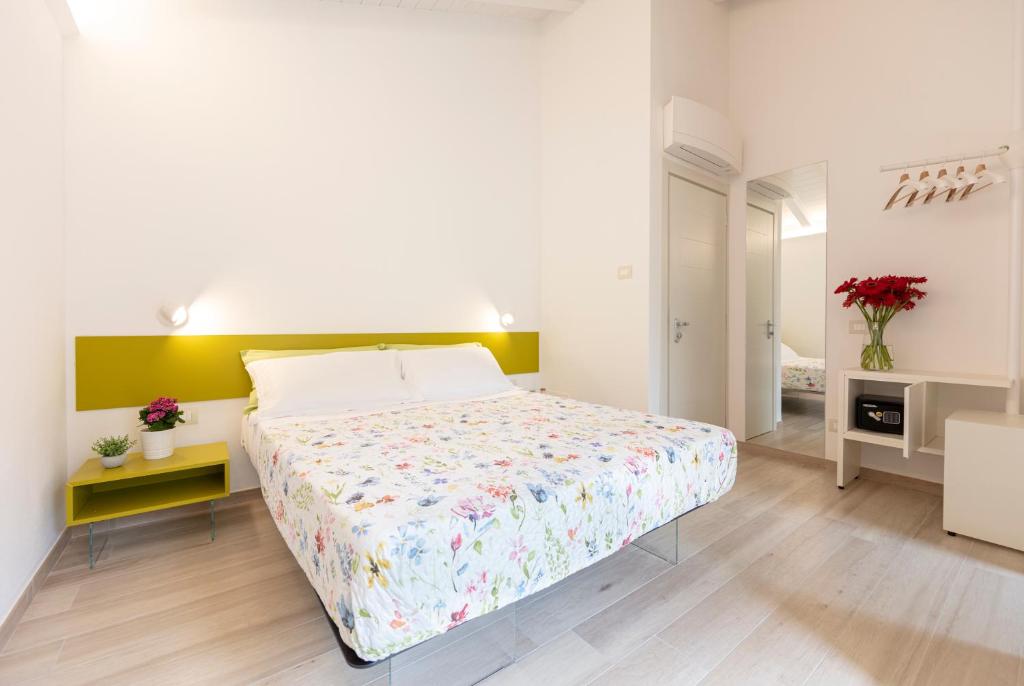 Postel nebo postele na pokoji v ubytování ARIA Design B&B Levanto