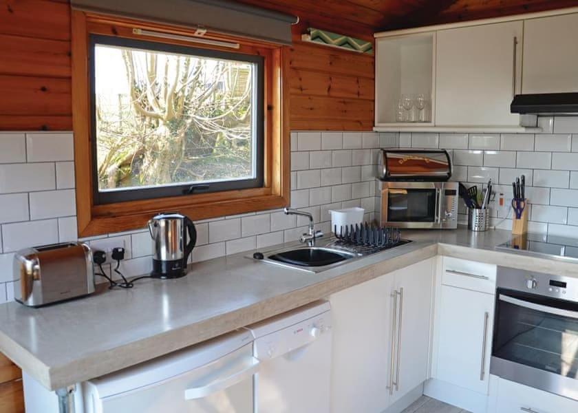 Kuchyň nebo kuchyňský kout v ubytování Avallon Lodges