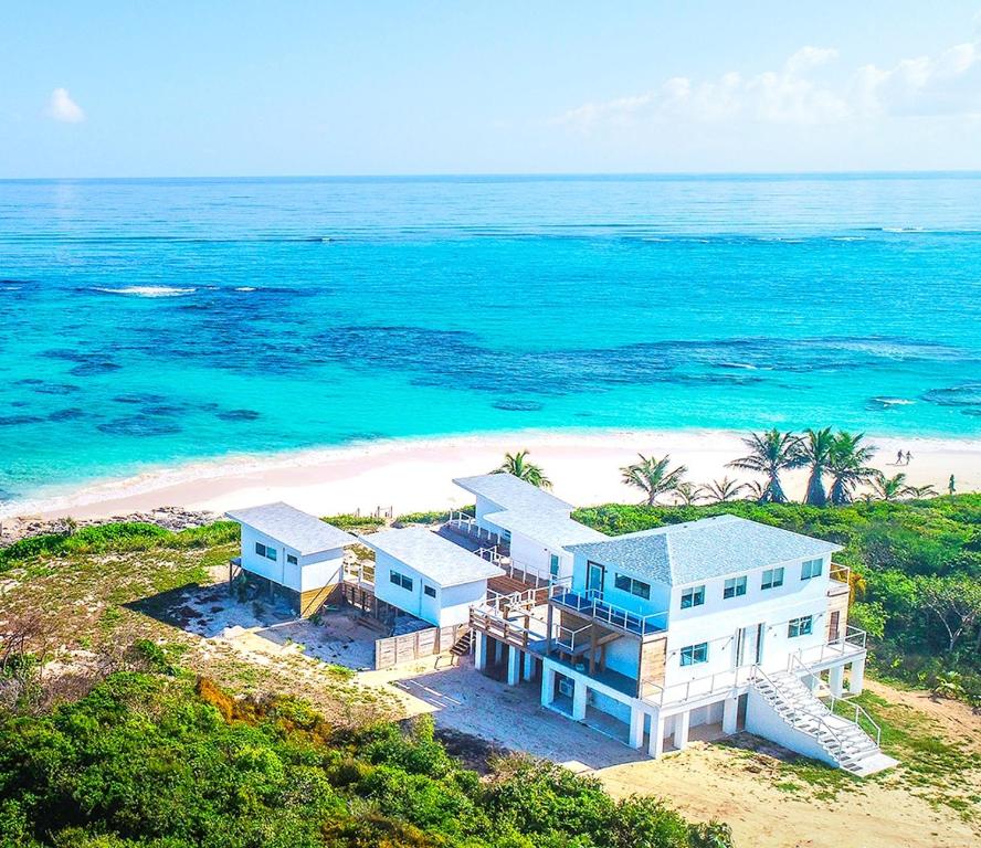 an aerial view of a house on the beach at Mika's Resort in Colebrooke Dale