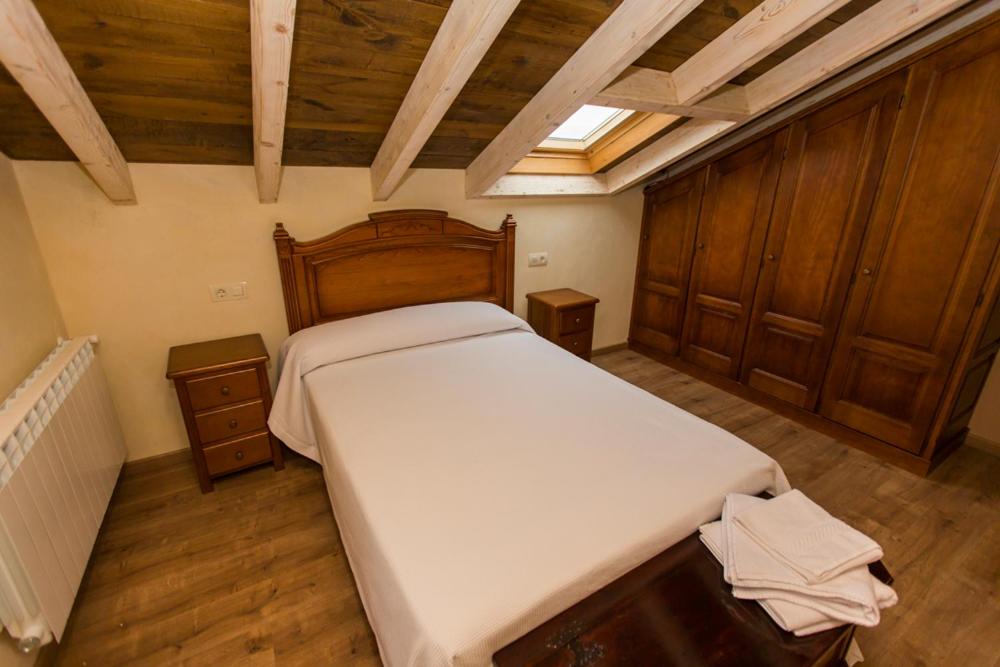 Postel nebo postele na pokoji v ubytování Apartamentos Casa Mateo