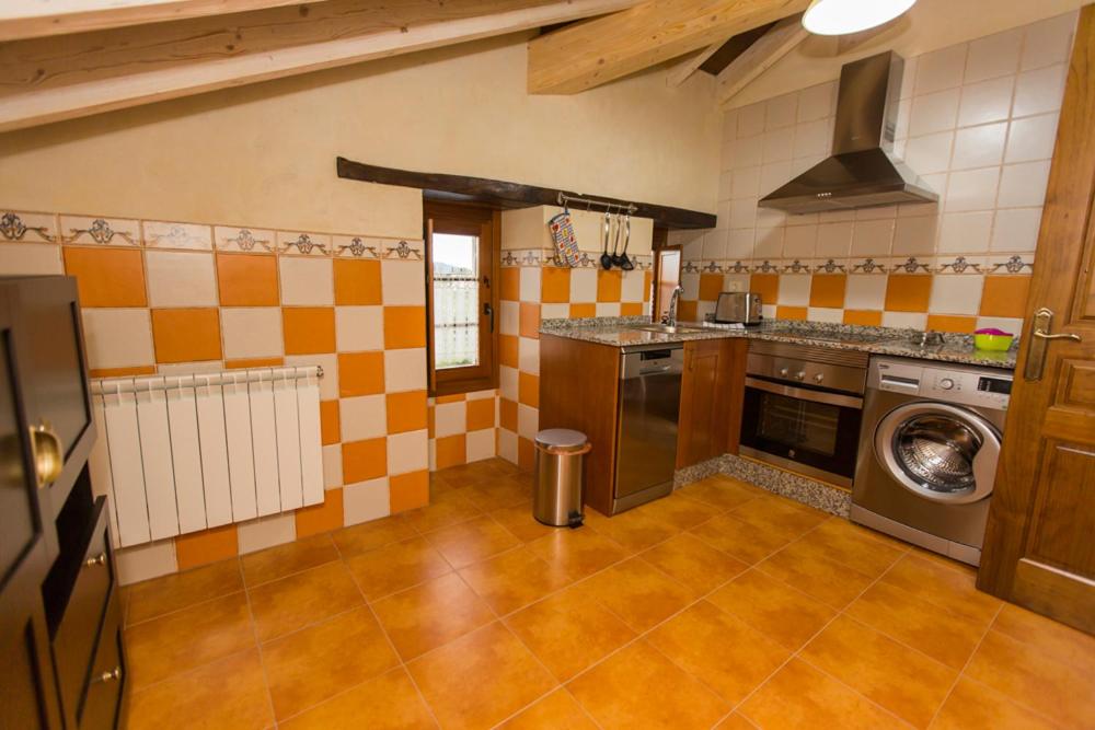 Kuchyň nebo kuchyňský kout v ubytování Apartamentos Casa Mateo