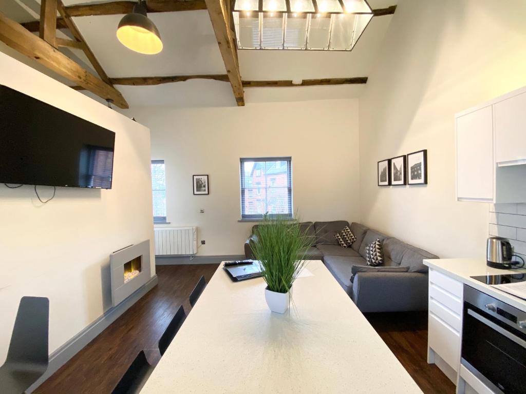 Kuchyň nebo kuchyňský kout v ubytování Loft at The Coach House Apartments