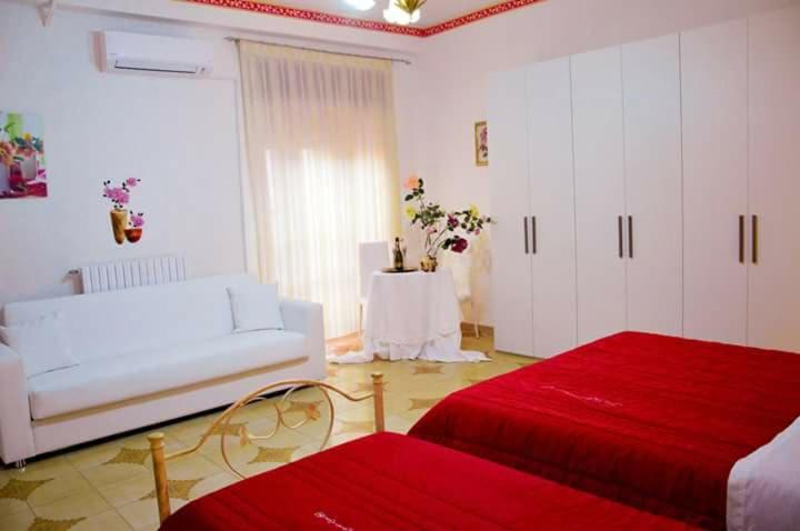 Postel nebo postele na pokoji v ubytování B&B La Felicità