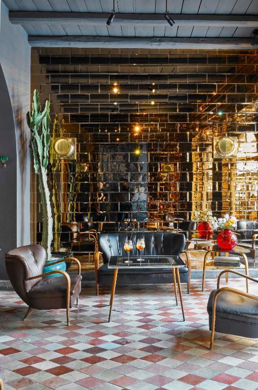 Część wypoczynkowa w obiekcie G-Rough, Rome, a Member of Design Hotels