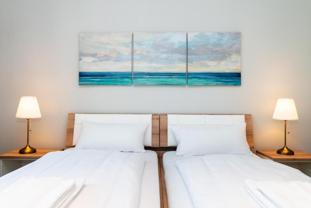 Postel nebo postele na pokoji v ubytování Fehmarn Mein Urlaub
