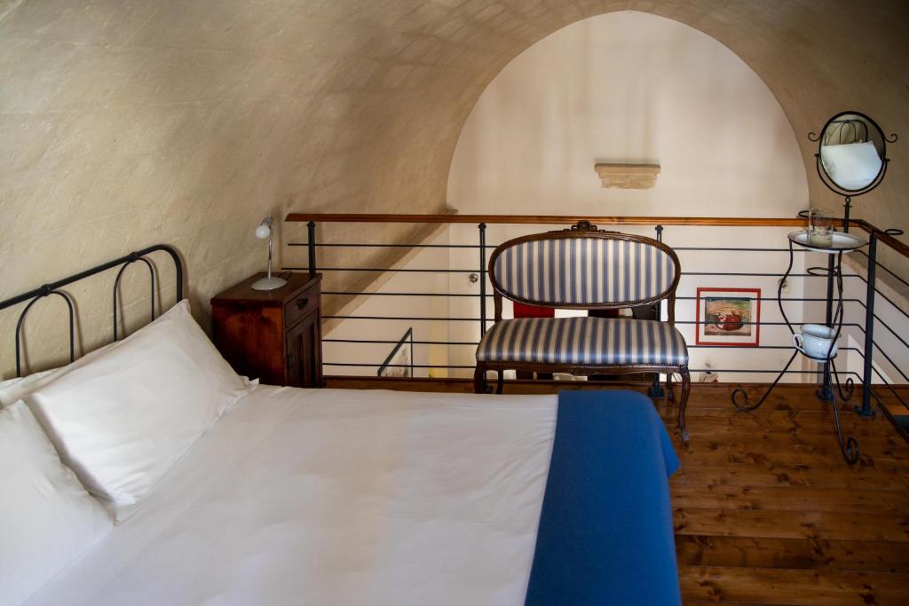 Postel nebo postele na pokoji v ubytování Hotel San Giorgio