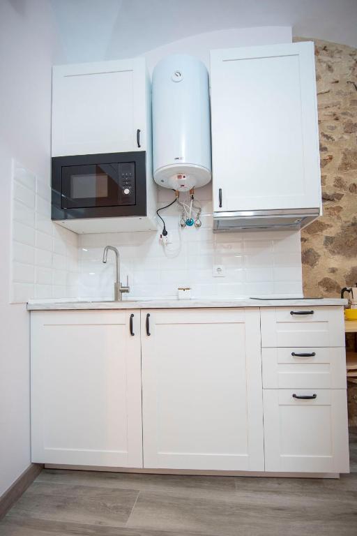 Kuchyň nebo kuchyňský kout v ubytování Apartamento nuevo Casco Antiguo AT Postigo 20