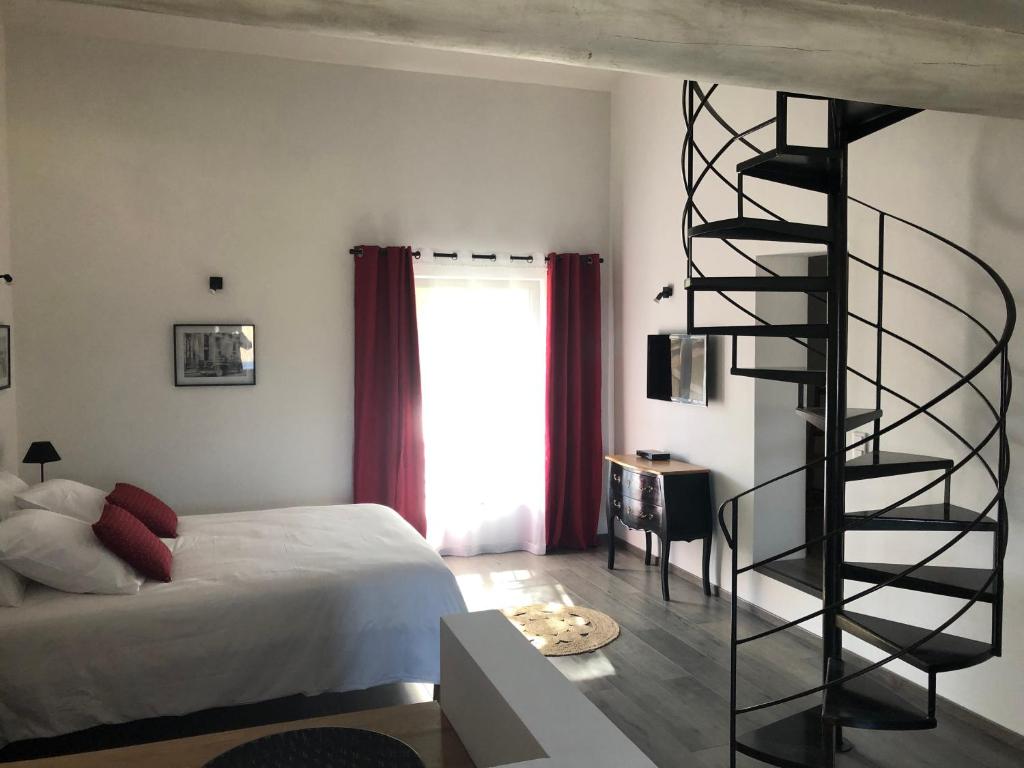 Postel nebo postele na pokoji v ubytování B&B dans Mas en pierres