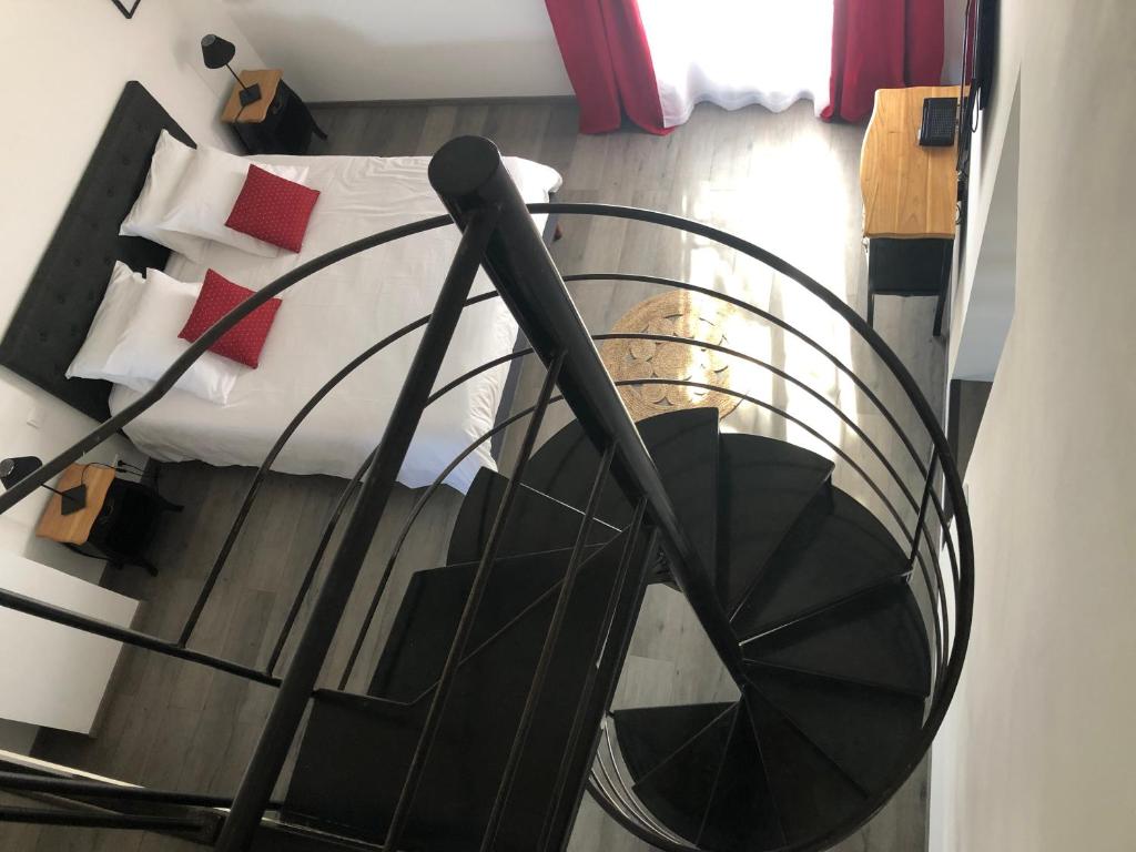 Postel nebo postele na pokoji v ubytování B&B dans Mas en pierres