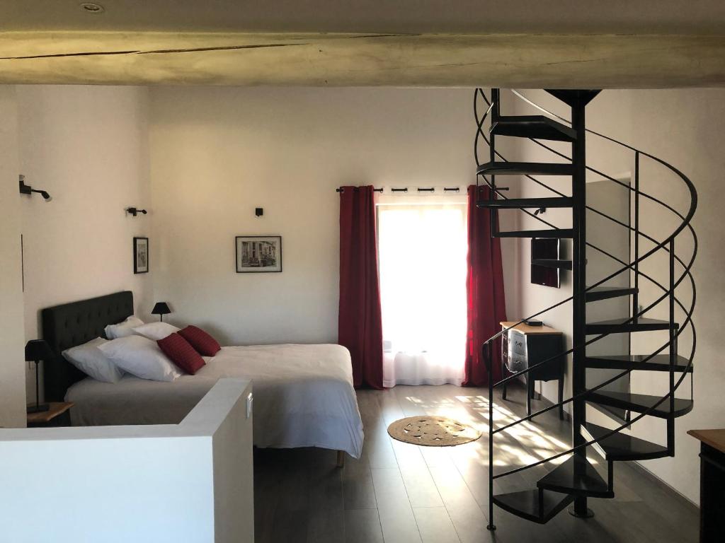 Postel nebo postele na pokoji v ubytování B&B dans Mas en pierres