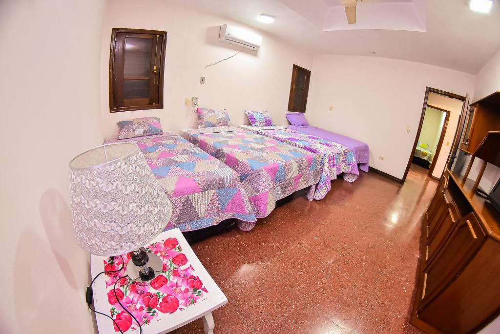 Postel nebo postele na pokoji v ubytování Palmera Hotel CDE