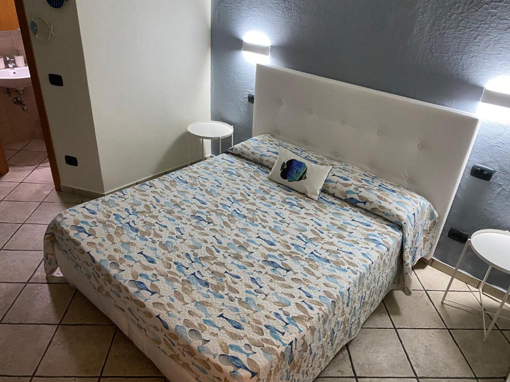 Posteľ alebo postele v izbe v ubytovaní B&B ALDA