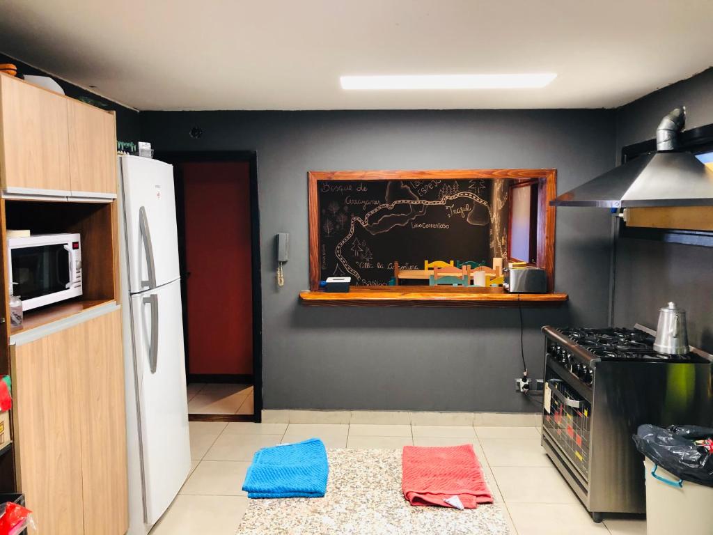 Kuchyň nebo kuchyňský kout v ubytování Hostel Olimpo House