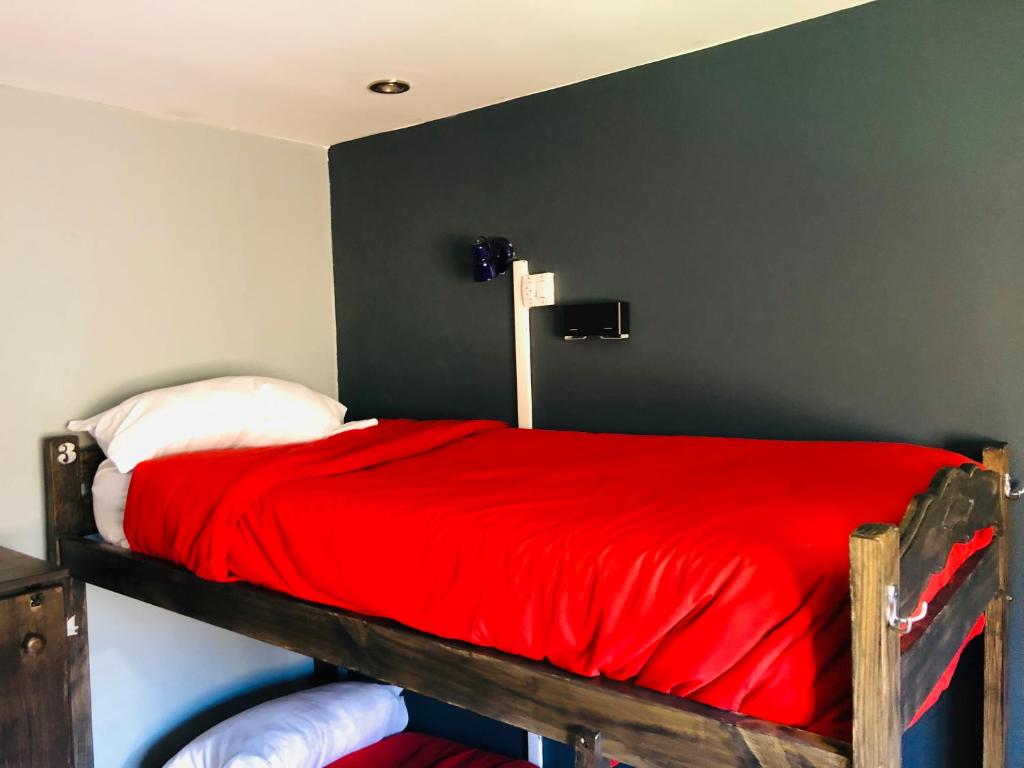 Postel nebo postele na pokoji v ubytování Hostel Olimpo House