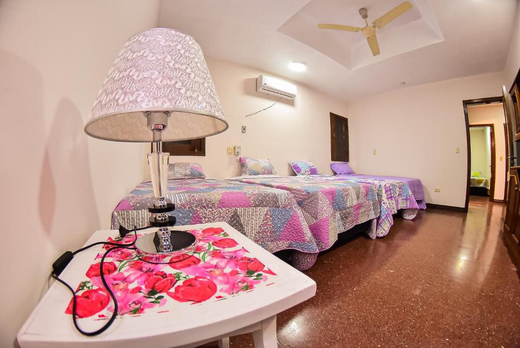 Postel nebo postele na pokoji v ubytování Palmera Hotel CDE