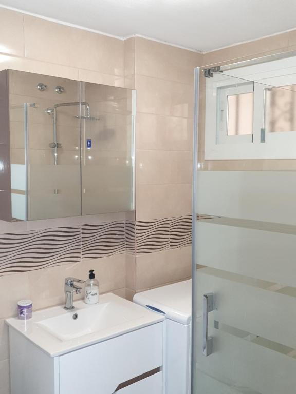 Kúpeľňa v ubytovaní EXKLUSIVA LÄGENHET I BENALMADENA