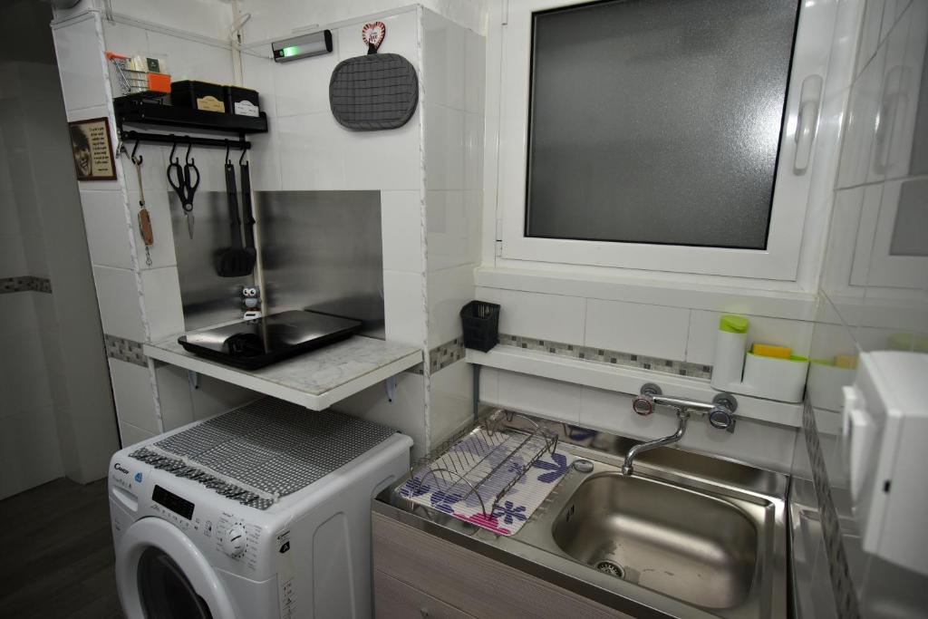 A kitchen or kitchenette at Diana Guest House