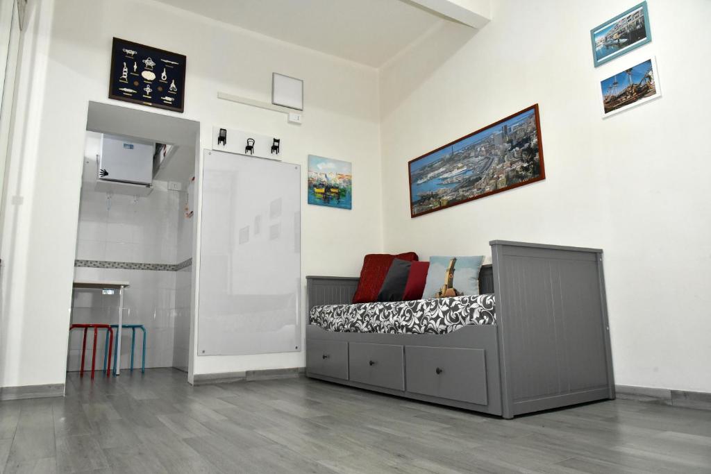 A bed or beds in a room at Diana Guest House