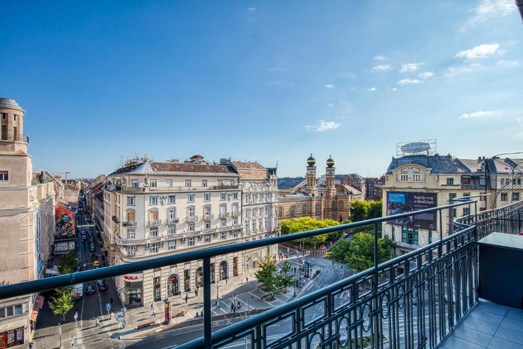 a view of a city from a balcony at Panoramic Smart Penthouse Central view of Grand Synagogue in Budapest