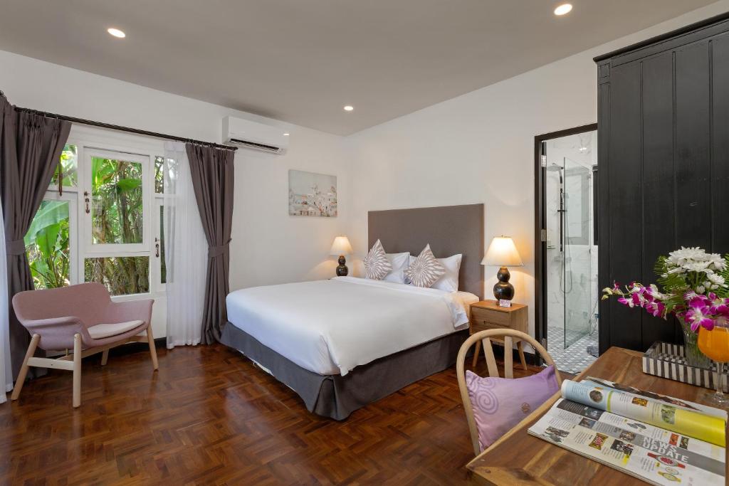 Postel nebo postele na pokoji v ubytování Patong Garden House - Luxury Villa in Patong Hills