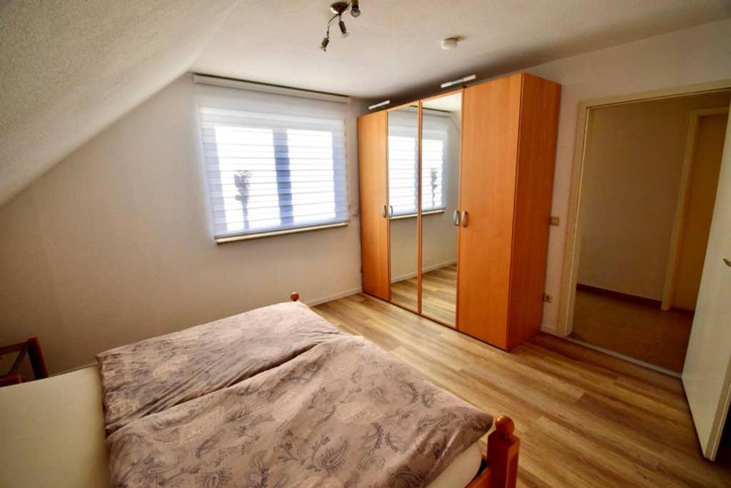 Postel nebo postele na pokoji v ubytování Ferienwohnung INGRID
