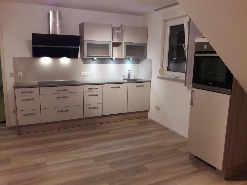 Kuchyň nebo kuchyňský kout v ubytování Ferienwohnung INGRID