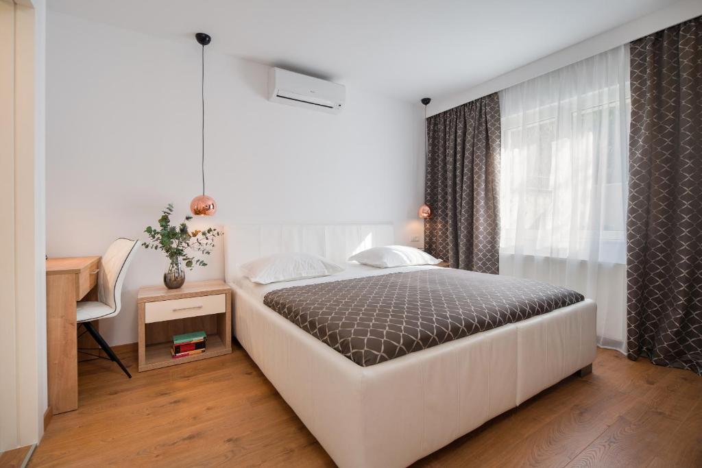 Postel nebo postele na pokoji v ubytování Villa Biston