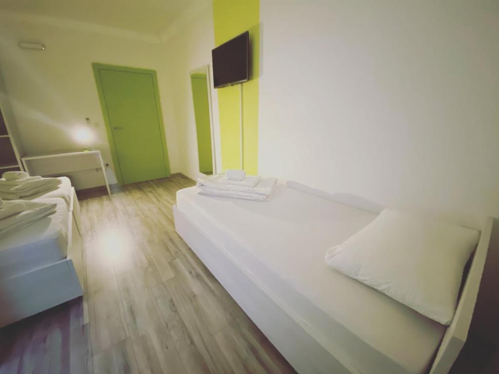 Postel nebo postele na pokoji v ubytování Pansion Fočin Han