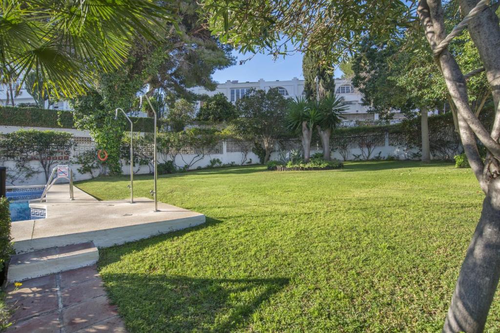 A garden outside Shiny Studio with Pool & Carihuela Beach at 500m