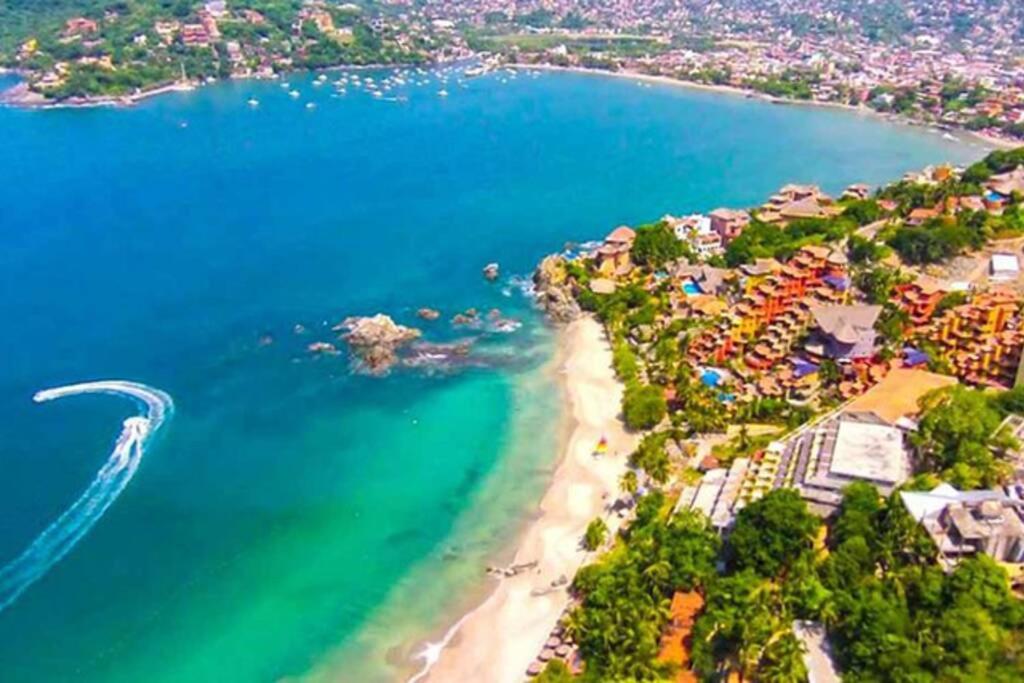 an aerial view of the beach at the resort at Ixtapa al mejor precio, "Casa las Conchas" in Zihuatanejo