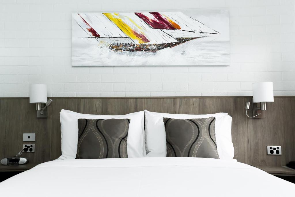 Postel nebo postele na pokoji v ubytování Bay Hotel Apartments