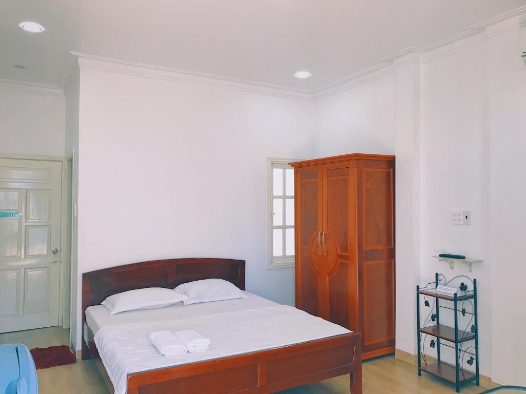 Postel nebo postele na pokoji v ubytování Hotel Khanh An
