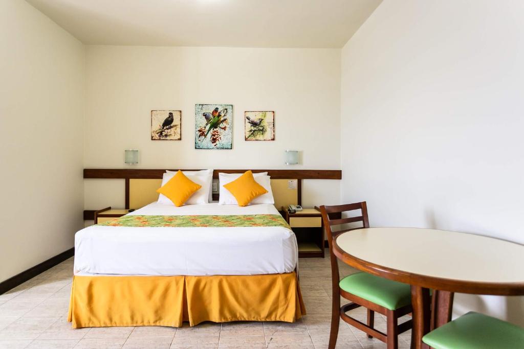 Postel nebo postele na pokoji v ubytování Hotel Verdemar