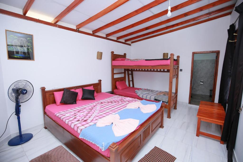 Postel nebo postele na pokoji v ubytování Rock side inn - Ella