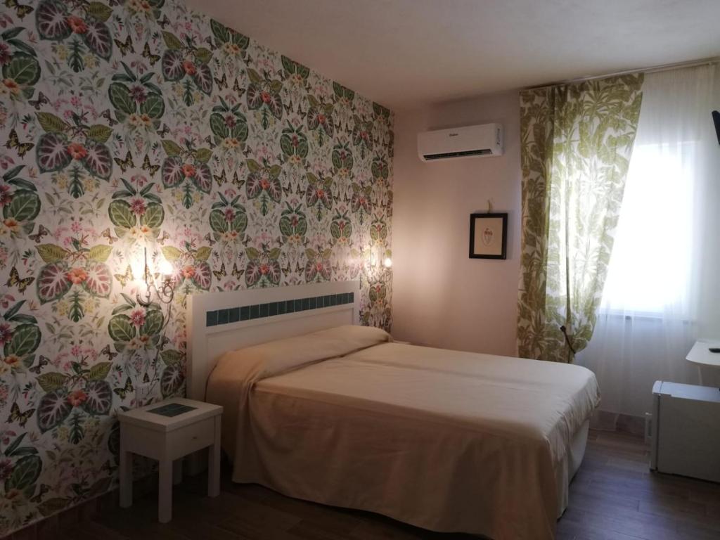 Posteľ alebo postele v izbe v ubytovaní Aramoni B&B