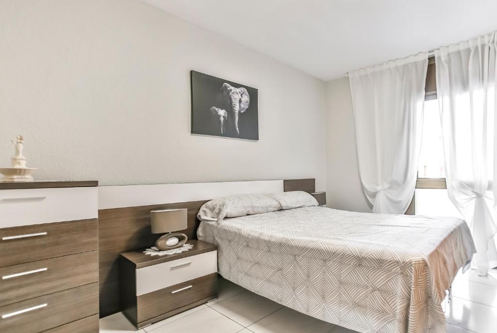 Posteľ alebo postele v izbe v ubytovaní Calafell Playa
