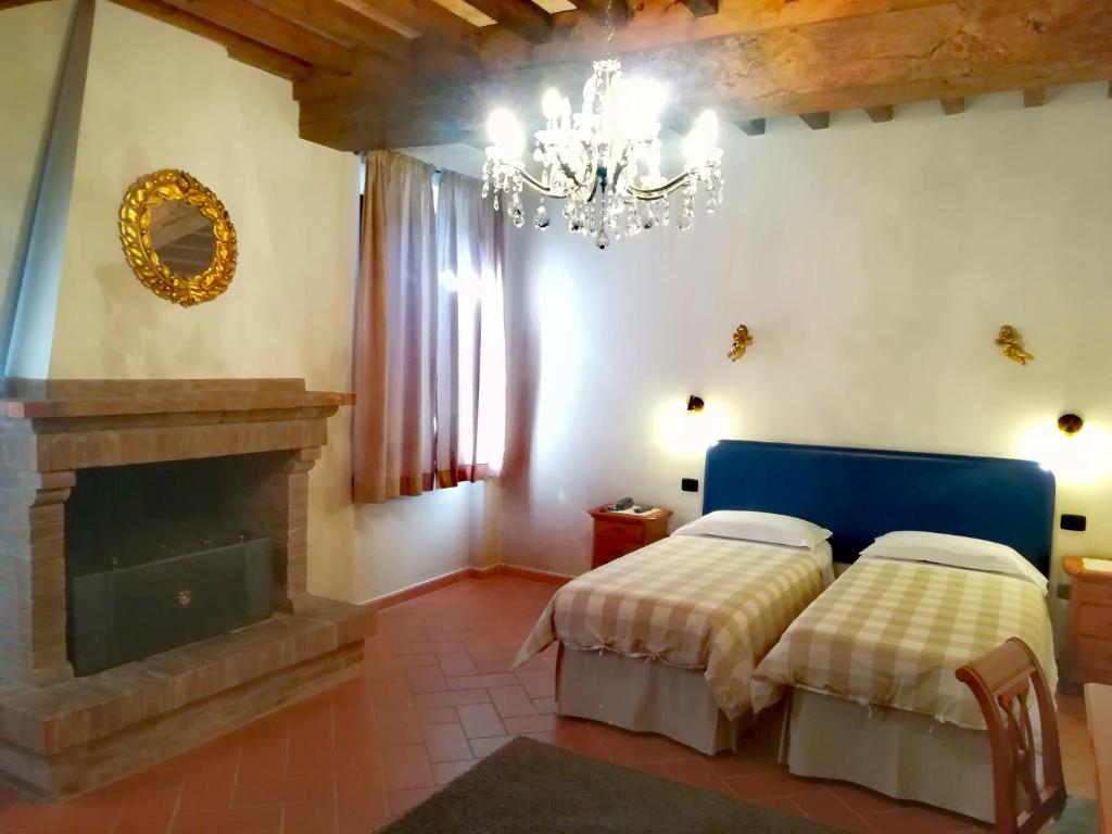 Letto o letti in una camera di Volivia Relais