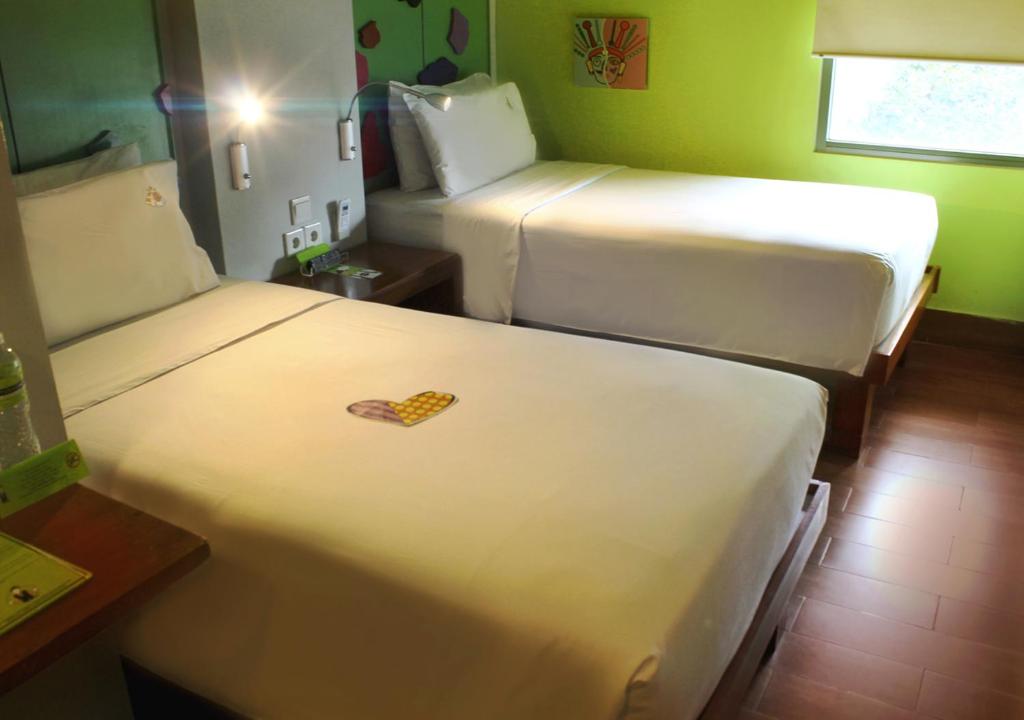 Katil atau katil-katil dalam bilik di MaxOneHotels.com at Sabang