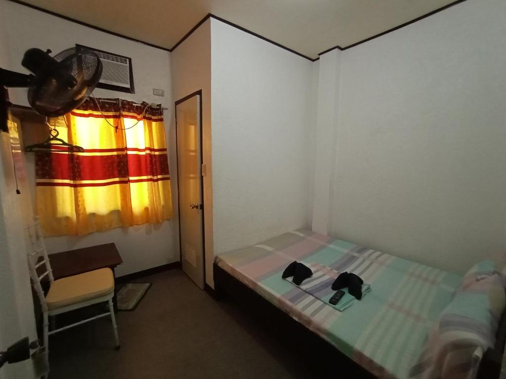 Postel nebo postele na pokoji v ubytování Ahras Place
