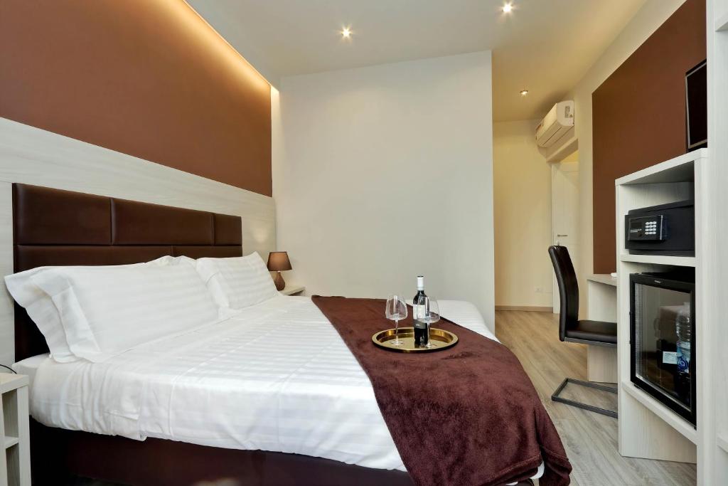 Posteľ alebo postele v izbe v ubytovaní Roma Suite Monti