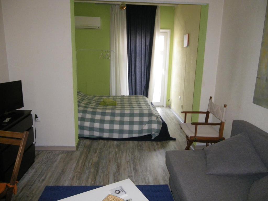 Posteľ alebo postele v izbe v ubytovaní Mini suite neighboring the center