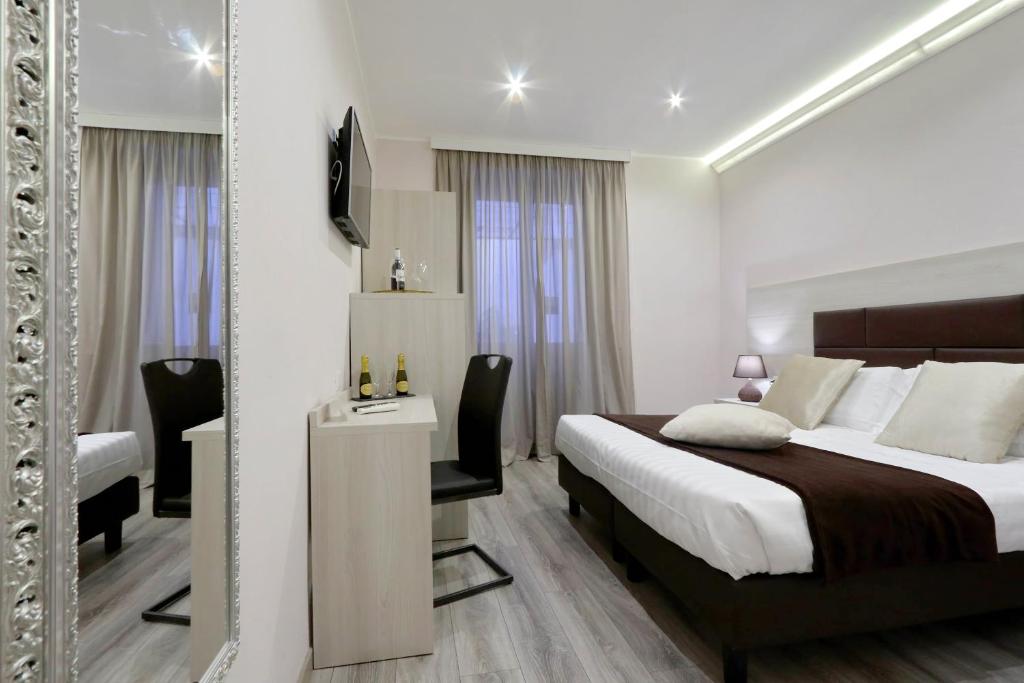 Posteľ alebo postele v izbe v ubytovaní Roma Suite Monti