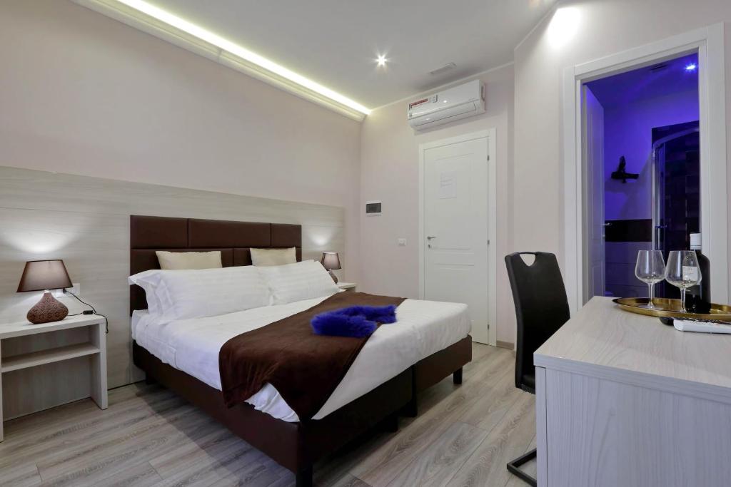 Posteľ alebo postele v izbe v ubytovaní Roma Suite Monti