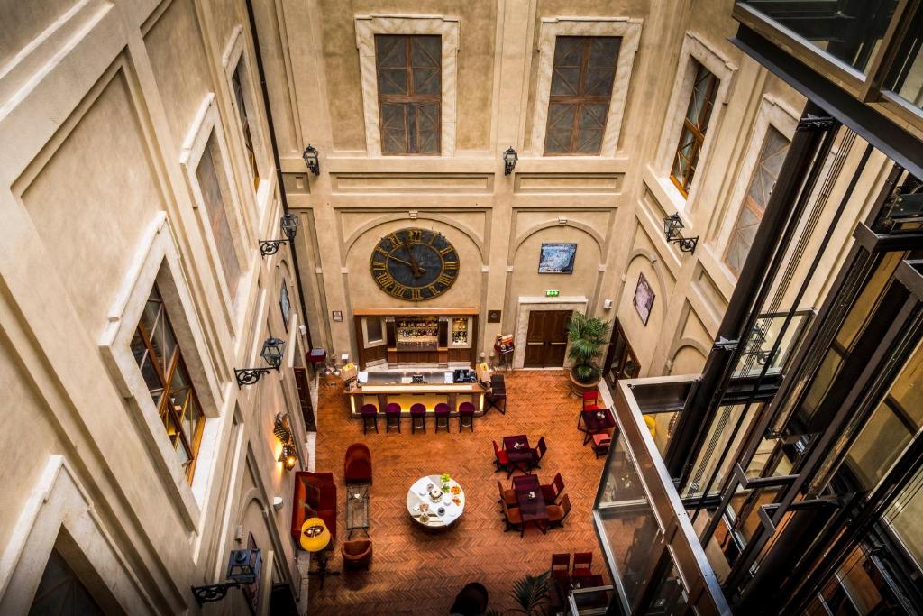 Posezení v ubytování Grand Hotel Continental Siena - Starhotels Collezione